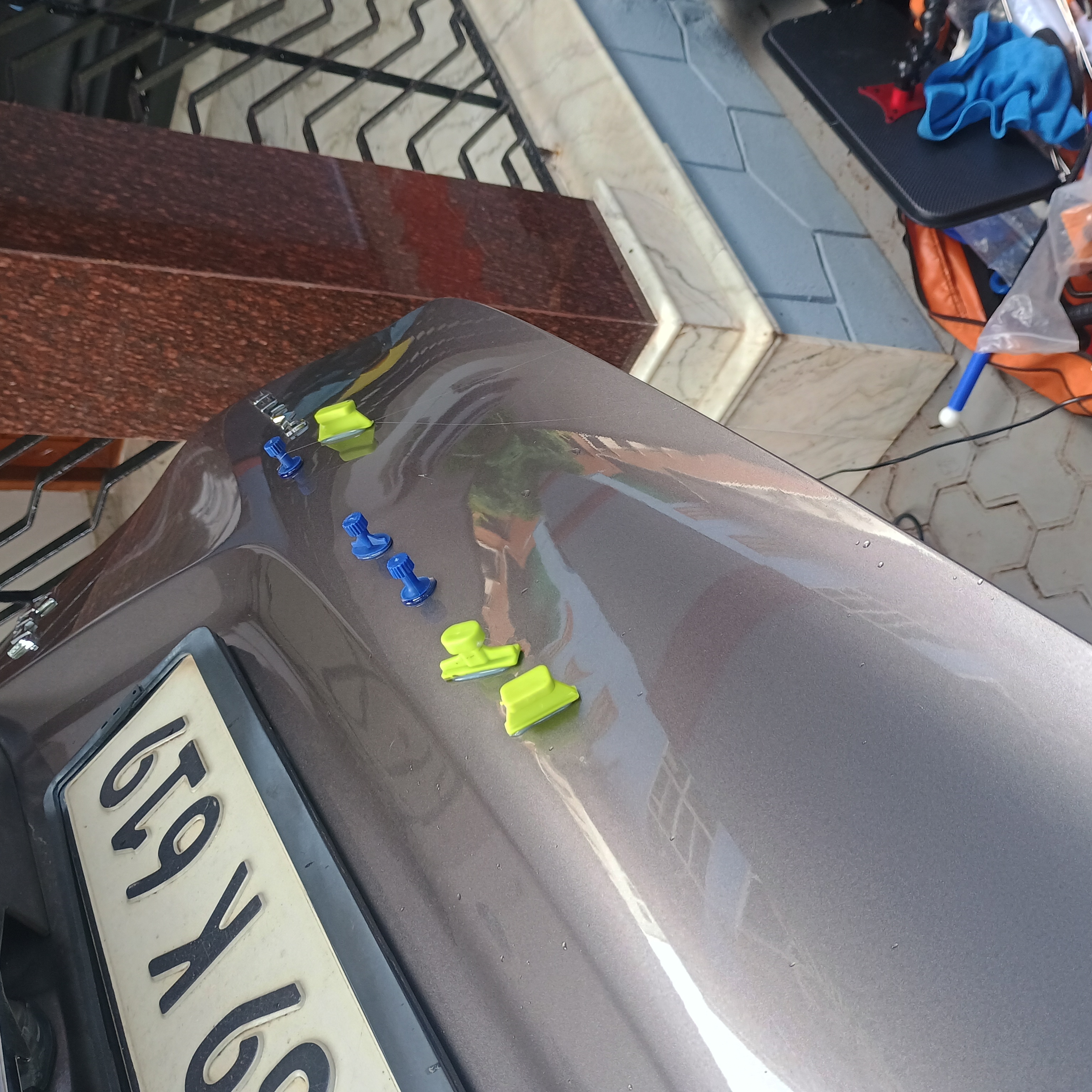 Glue pulling dent repair technique
